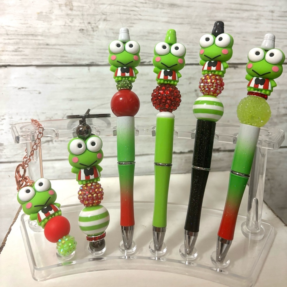 Sanrio keropi and batz pens, keychains, and stanley charms